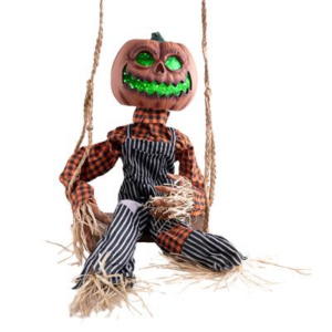 Zucca spaventapasseri animata sull'altalena
